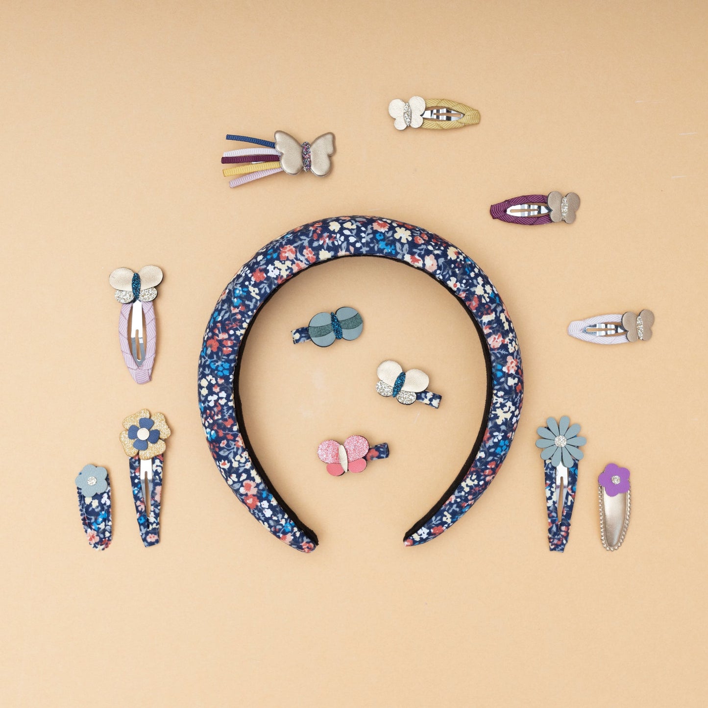 FLEUR PADDED ALICE BAND HAARREIF