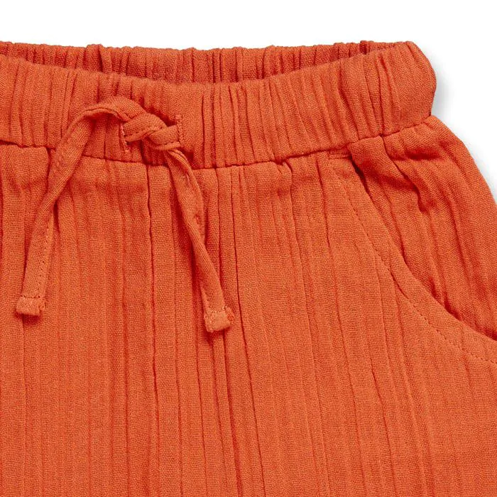 LOKI Babyhose aus weichem Musselin in Rost-Rot aus Biobaumwolle - Sense Organics