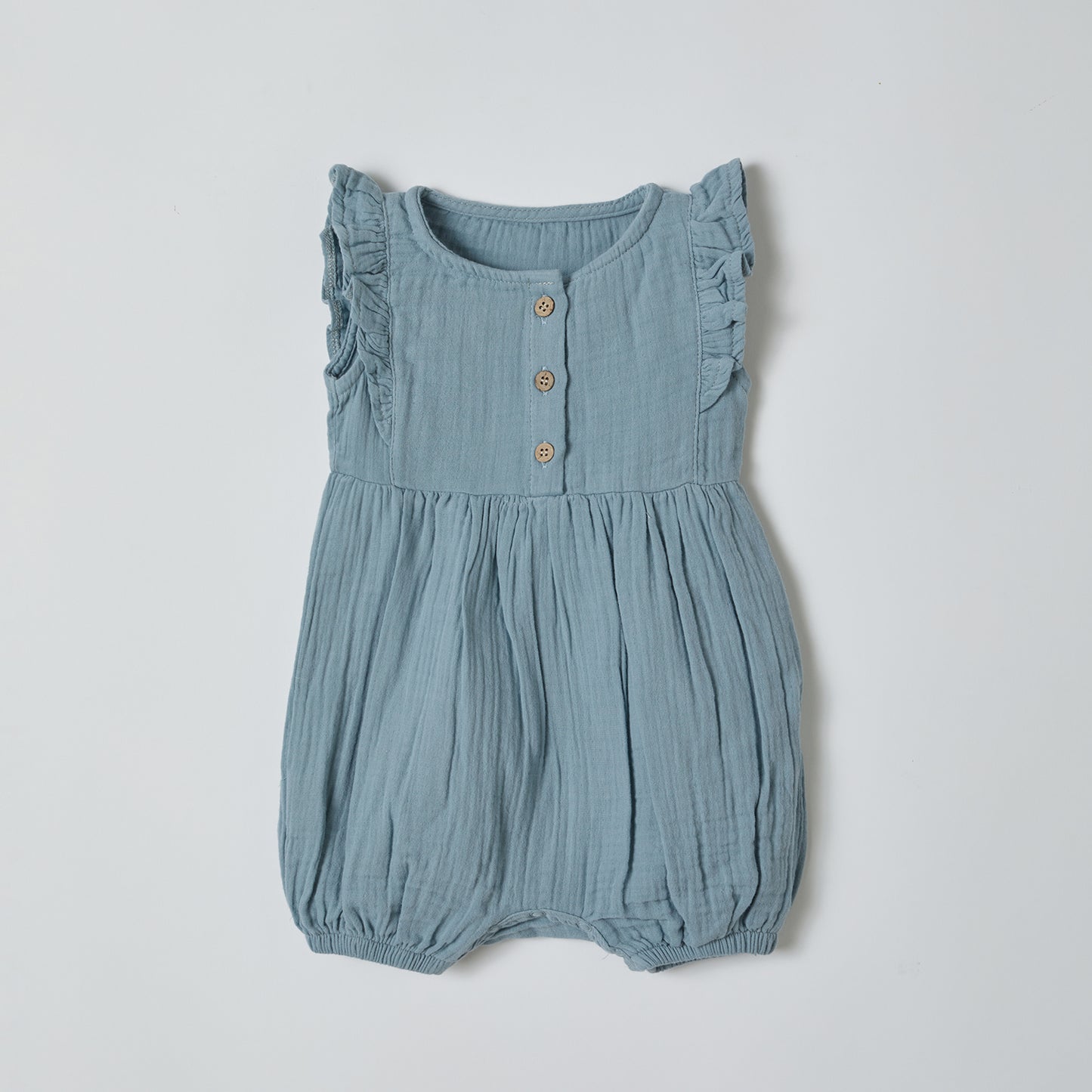 Weicher Musselin-Babyspielanzug in aqua-blau aus Biobaumwolle | OrganicEra